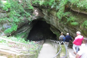 Descending down the original entrance to the cave